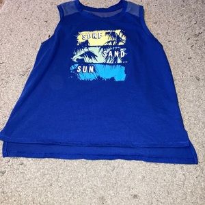 A blue graphic tank top with open back.